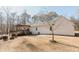 White house exterior with deck and spacious yard at 511 Laird Rd, Hiram, GA 30141