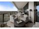 Spacious balcony furnished with lounge chairs, perfect for outdoor relaxation and entertaining at 2520 Peachtree Nw Rd # 1202, Atlanta, GA 30305