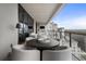Expansive balcony with seating offers panoramic views of the cityscape and lush surroundings at 2520 Peachtree Nw Rd # 1202, Atlanta, GA 30305