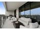 Relaxing balcony with outdoor grill and plush seating, perfect for entertaining guests at 2520 Peachtree Nw Rd # 1202, Atlanta, GA 30305
