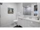 Bright bathroom with a sleek vanity and a modern glass-enclosed shower at 2520 Peachtree Nw Rd # 1202, Atlanta, GA 30305