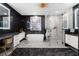Luxurious bathroom featuring double sinks, soaking tub, and a spacious glass shower at 2520 Peachtree Nw Rd # 1202, Atlanta, GA 30305