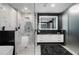 Modern bathroom with a glass-enclosed shower, sleek vanity, and elegant fixtures at 2520 Peachtree Nw Rd # 1202, Atlanta, GA 30305