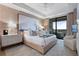Serene bedroom with large windows, plush bedding, and access to a private balcony at 2520 Peachtree Nw Rd # 1202, Atlanta, GA 30305