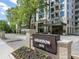 Elegant entrance to Graydon Buckhead with stone accents, manicured landscaping, and prominent signage at 2520 Peachtree Nw Rd # 1202, Atlanta, GA 30305