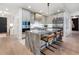 Elegant kitchen with a marble island, modern appliances and breakfast bar seating at 2520 Peachtree Nw Rd # 1202, Atlanta, GA 30305