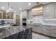 Modern kitchen showcasing sleek cabinetry, top-of-the-line appliances, and a marble island at 2520 Peachtree Nw Rd # 1202, Atlanta, GA 30305