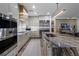 Beautiful kitchen featuring stainless steel appliances, a marble island and plenty of cabinet storage space at 2520 Peachtree Nw Rd # 1202, Atlanta, GA 30305