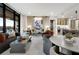 Bright, open living space features expansive windows and contemporary decor at 2520 Peachtree Nw Rd # 1202, Atlanta, GA 30305