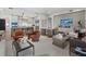 Open concept living space with modern kitchen, dining area, and cozy lounge seating at 2520 Peachtree Nw Rd # 1202, Atlanta, GA 30305