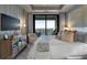 Beautiful bedroom with large bed, outside balcony, and mirrored dresser at 2520 Peachtree Nw Rd # 1202, Atlanta, GA 30305