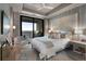 Serene bedroom features balcony access, neutral decor, and modern furnishings at 2520 Peachtree Nw Rd # 1202, Atlanta, GA 30305