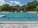 Upscale swimming pool with lounge seating and covered dining area offers a luxurious outdoor experience at 2520 Peachtree Nw Rd # 1202, Atlanta, GA 30305