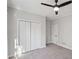 Bedroom featuring carpet and closet doors at 811 Somersby Dr, Dallas, GA 30157