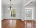 Spacious dining area with hardwood floors and large windows at 811 Somersby Dr, Dallas, GA 30157