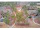 Aerial view showcases the property nestled among trees, highlighting its private setting at 93 Highway 81, Oxford, GA 30054