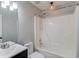 Bathroom featuring a tub and shower combo, along with modern vanity at 93 Highway 81, Oxford, GA 30054