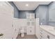 Bathroom featuring a toilet, storage, tile floors, and a white vanity with drawers at 93 Highway 81, Oxford, GA 30054