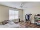 Minimal bedroom with a large window, bed, ceiling fan, and closet at 93 Highway 81, Oxford, GA 30054