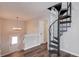 Entryway features a unique wrought-iron spiral staircase at 93 Highway 81, Oxford, GA 30054
