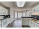Bright kitchen featuring a breakfast nook, stainless appliances, dark backsplash and wooden countertops at 93 Highway 81, Oxford, GA 30054