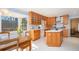 Spacious kitchen with light wood cabinets, island, and white countertops at 1359 Ragley Hall Ne Rd, Brookhaven, GA 30319