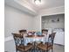 Cozy dining area adjacent to the kitchen, complete with a round table, seating for four, and nearby laundry area at 1619 Ridgeview Nw Dr, Conyers, GA 30012