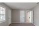 Bright and airy room with new carpet, doors, and freshly painted walls at 1619 Ridgeview Nw Dr, Conyers, GA 30012