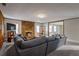 Comfortable living room with stone fireplace and a large sectional sofa at 1619 Ridgeview Nw Dr, Conyers, GA 30012