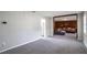 Open living room with a view of the den that offers a cozy seating area at 1619 Ridgeview Nw Dr, Conyers, GA 30012