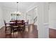 Bright dining room with hardwood floors and a view of the entryway at 4535 Meadow Green Ln, Acworth, GA 30101