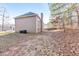 View of the backyard, showing the house's exterior and ample space at 8270 Mossybrook Ln, Douglasville, GA 30135