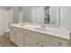 Bathroom featuring double sinks and a shower/bath combo at 8270 Mossybrook Ln, Douglasville, GA 30135
