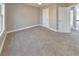 Spacious bedroom featuring carpet flooring at 8270 Mossybrook Ln, Douglasville, GA 30135