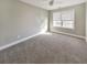 Cozy bedroom with natural light and a ceiling fan at 8270 Mossybrook Ln, Douglasville, GA 30135