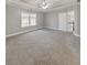 Spacious main bedroom with a ceiling fan, and natural light at 8270 Mossybrook Ln, Douglasville, GA 30135