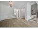 Bright dining room with hardwood floors, chandelier, and access to a deck at 1976 Flying Scotsman Dr # 8, Kennesaw, GA 30144