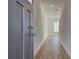 Bright entry hall with gray door and wood-look floors at 329 Shine Dr, Stockbridge, GA 30281