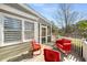 Back deck with red metal patio furniture. Ideal spot for relaxing or entertaining at 3495 Habersham Nw Rd, Atlanta, GA 30305
