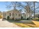 Charming home with a stone walkway, mature landscaping, and a sunny front yard at 3495 Habersham Nw Rd, Atlanta, GA 30305