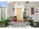 Elegant front door with decorative columns, black lanterns, and stone steps offers welcoming curb appeal at 3495 Habersham Nw Rd, Atlanta, GA 30305