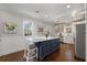 Open kitchen with a large center island, modern appliances, and hardwood floors at 3495 Habersham Nw Rd, Atlanta, GA 30305
