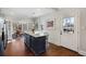 Well-lit kitchen featuring an island with a marble countertop and stainless steel appliances at 3495 Habersham Nw Rd, Atlanta, GA 30305