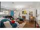 Elegant living room with a fireplace, hardwood floors, and stylish decor at 3495 Habersham Nw Rd, Atlanta, GA 30305