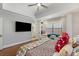 Bright main bedroom featuring a large window seat, and adjacent bath at 3495 Habersham Nw Rd, Atlanta, GA 30305