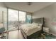 Bedroom with city views and hardwood floors at 1080 Peachtree Ne St # 2710, Atlanta, GA 30309