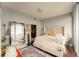 Bedroom with large windows and city views at 1080 Peachtree Ne St # 2710, Atlanta, GA 30309