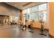 Fitness center with modern cardio equipment and large windows at 1080 Peachtree Ne St # 2710, Atlanta, GA 30309