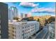 Stunning aerial view showcasing cityscape and tree-lined streets at 1280 W Peachtree Nw St # 2813, Atlanta, GA 30309