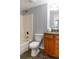 Clean bathroom with wood vanity and shower/tub combo at 1280 W Peachtree Nw St # 2813, Atlanta, GA 30309